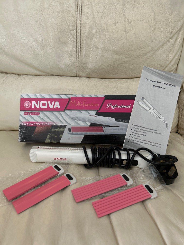 Nova Multi-function 造型夾 （分類：健康及美容 - 頭髮護理）位於 Hong Kong。 由 pasumama 提交（商品編號 1225728427，圖片 2）。簡介： 髮夾性能良好，加熱即用，有三個不同夾板可更換，直髮、微灣及波浪紋。方便好用。。