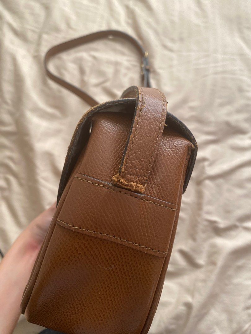 renoma brown saddle cross body bag (Category: Cross-body Bags) located in Cainta. Submitted by sanri0girl (Listing ID 1225804552, Image 3). Description: authentic brand! the flaws are fixable and the bag is still usable nonetheless :) a free bag comes with every purchase of any bag recently posted as well .