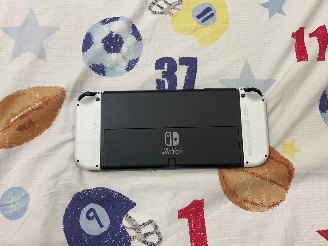 SWITCH OLED (Category: Nintendo) located in Porac. Submitted by b3rde.21xxx (Listing ID 1225828236, Image 1). Description: Good as new! Additional 2k para sa harvest moon na bala. Pass sa swap. Kung ano pong nakikita niyo sa picture yan lang yung kasama..
