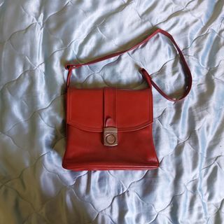 VINTAGE leather red messenger sling bag