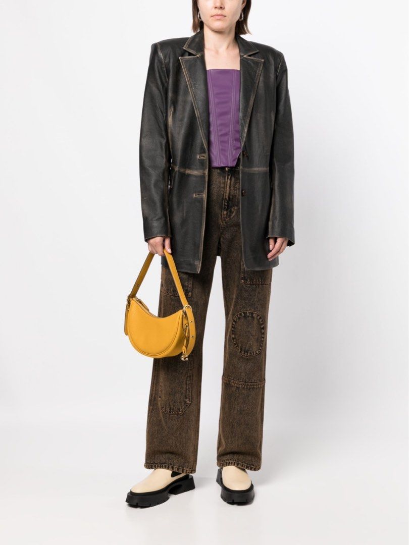 Authentic Coach Luna Shoulder Bag Mustard Yellow (Category: Luxury Bags & Wallets) located in Quezon City. Submitted by selinabu (Listing ID 1226111216, Image 1). Description: Coach reinvents a 1990s-inspired silhouette for SS23, as shown by the Luna bag. Here, the curved-edged accessory is designed in a mustard yellow hue that complements its pebbled calf leather construction and gunmetal-tone hardware. Highlights dark yellow leather grained tex