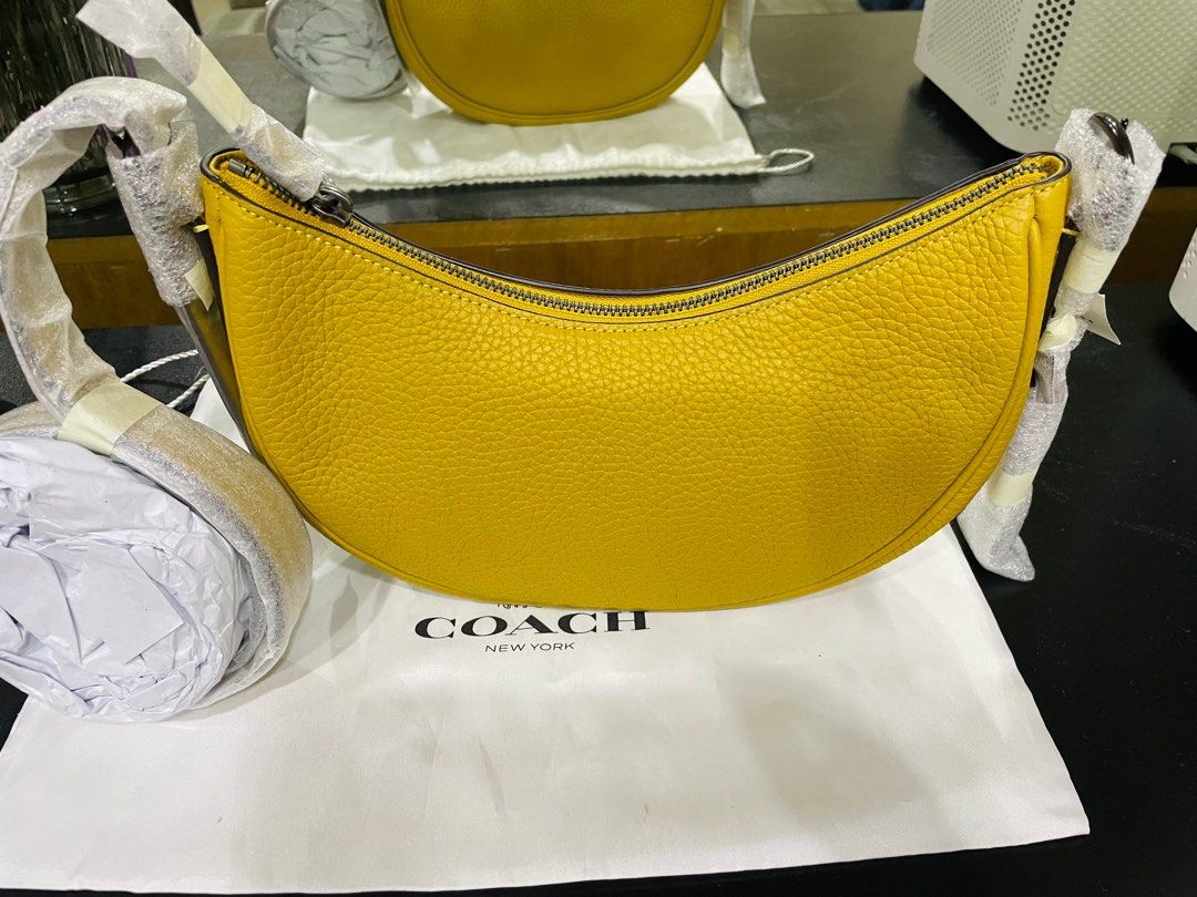 Yellow coach trafficked shoulder bag