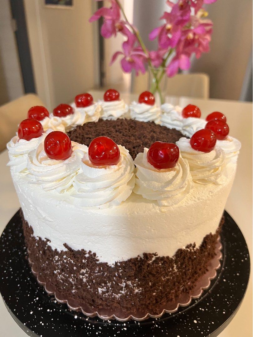 Black Forest cake (Category: Homemade Bakes) located in Singapore. Submitted by mojadesserts (Listing ID 1226087566, Image 1). Description: 4 layers of 8-inch size of Moist Chocolate sponge cake with a rich cherry filling, chocolate ganache , whip cream and creamcheese frosting as well as with cherries on top and decor with chocolate shaving. IMPORTANT PLEASE READ BEFORE ORDERING: Due to my work, I can only accept an order to be delivered on SATU