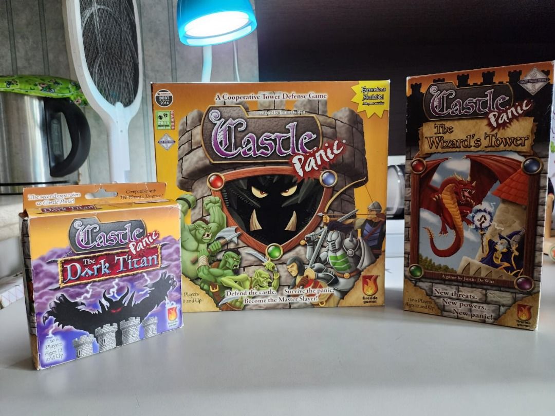 CASTLE PANIC - with 2 expansions (Wizard's Tower & Dark Titan) (Category: Board Games & Puzzles) located in Makati City. Submitted by chubby_daddy (Listing ID 1225978594, Image 1). Description: One of the best family cooperative games ever invented. And very hard to find in Philippines Castle Panic Base Game + Wizard's Tower (1st expansion) + Dark Titan (2nd expansion) Well taken care of, used but not abused. RFS - this is my second copy.