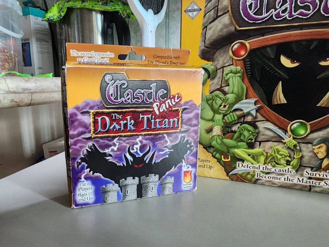 CASTLE PANIC - with 2 expansions (Wizard's Tower & Dark Titan) (Category: Board Games & Puzzles) located in Makati City. Submitted by chubby_daddy (Listing ID 1225978594, Image 2). Description: One of the best family cooperative games ever invented. And very hard to find in Philippines Castle Panic Base Game + Wizard's Tower (1st expansion) + Dark Titan (2nd expansion) Well taken care of, used but not abused. RFS - this is my second copy.