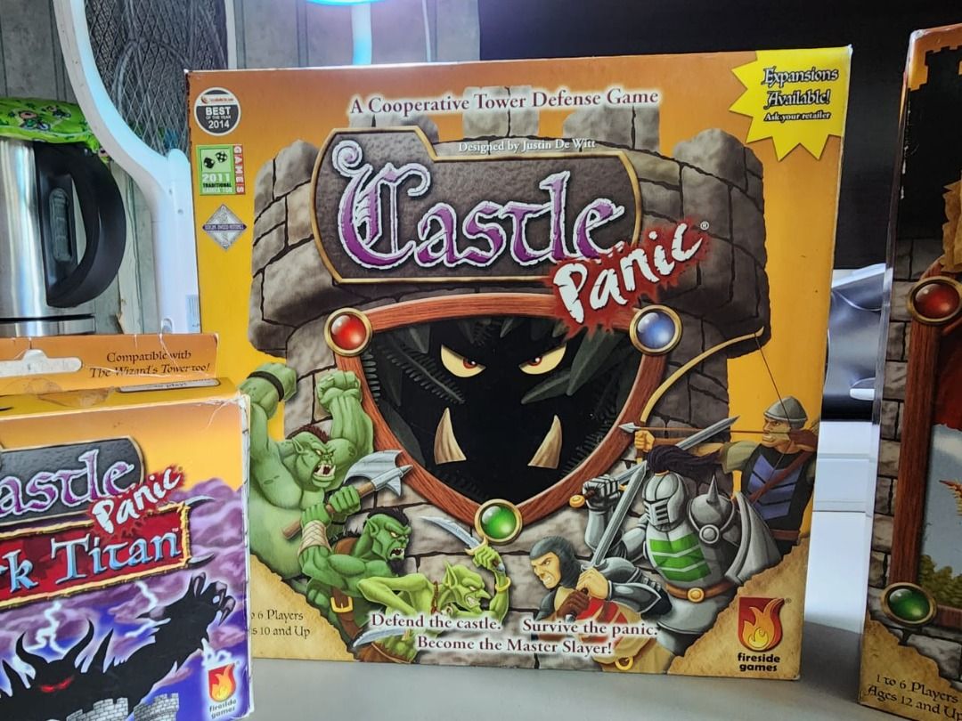 CASTLE PANIC - with 2 expansions (Wizard's Tower & Dark Titan) (Category: Board Games & Puzzles) located in Makati City. Submitted by chubby_daddy (Listing ID 1225978594, Image 3). Description: One of the best family cooperative games ever invented. And very hard to find in Philippines Castle Panic Base Game + Wizard's Tower (1st expansion) + Dark Titan (2nd expansion) Well taken care of, used but not abused. RFS - this is my second copy.
