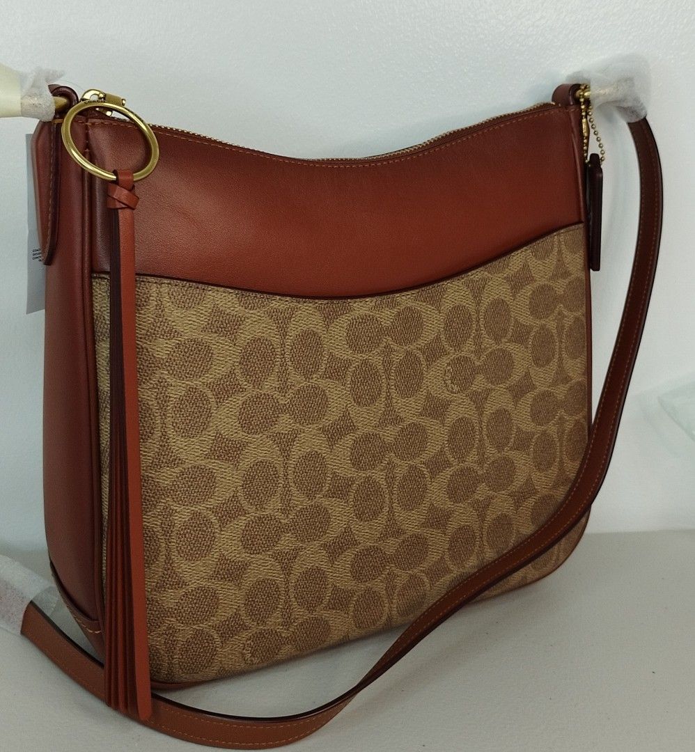Chaise Crossbody In Signature Canvas, Luxury, Bags & Wallets on Carousell