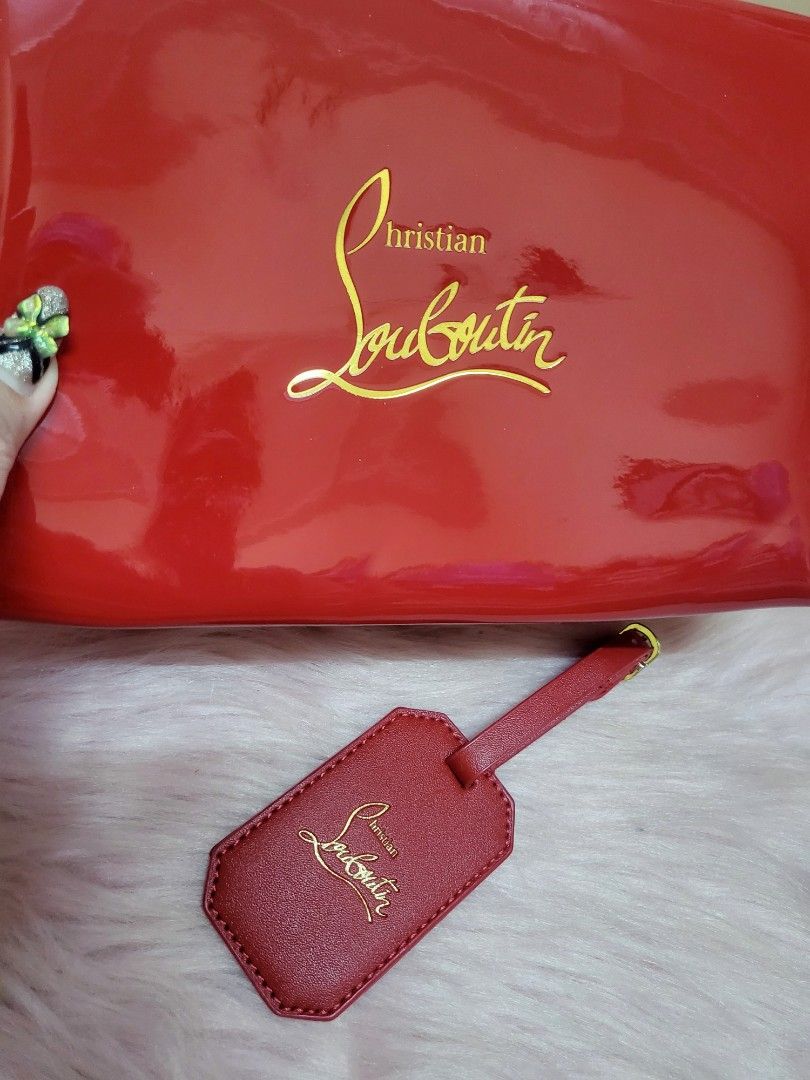 Louboutin tag top