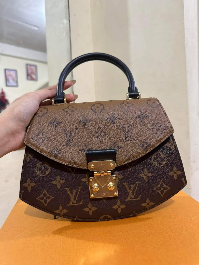 Louis Vuitton Monogram Reverse Canvas Tilsitt Handbag – EliteLaza