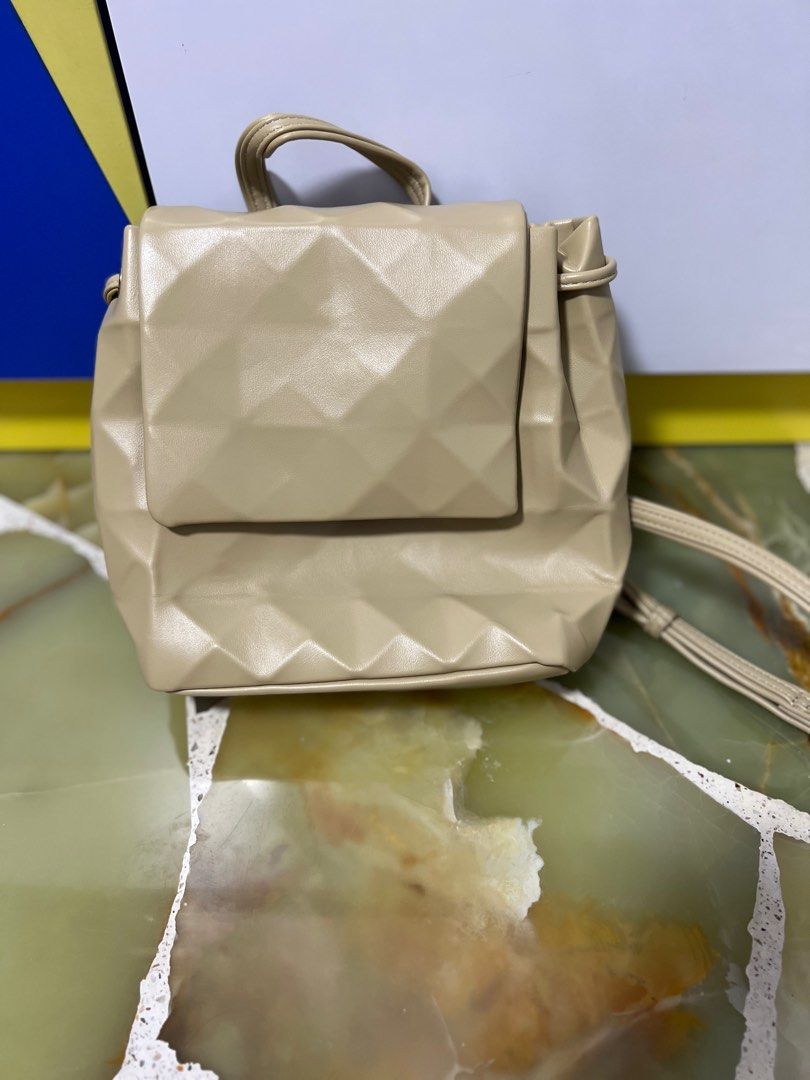 Mini backpack (Category: Backpacks) located in Singapore. Submitted by abbytay98 (Listing ID 1226106263, Image 1). Description: Condition: 9.5/10 Still in good condition with dust bag included. Dimension: 28cm x 22cm x 10cm Do allow a difference of 2cm. To find out more, do message me. Thanks! :) .