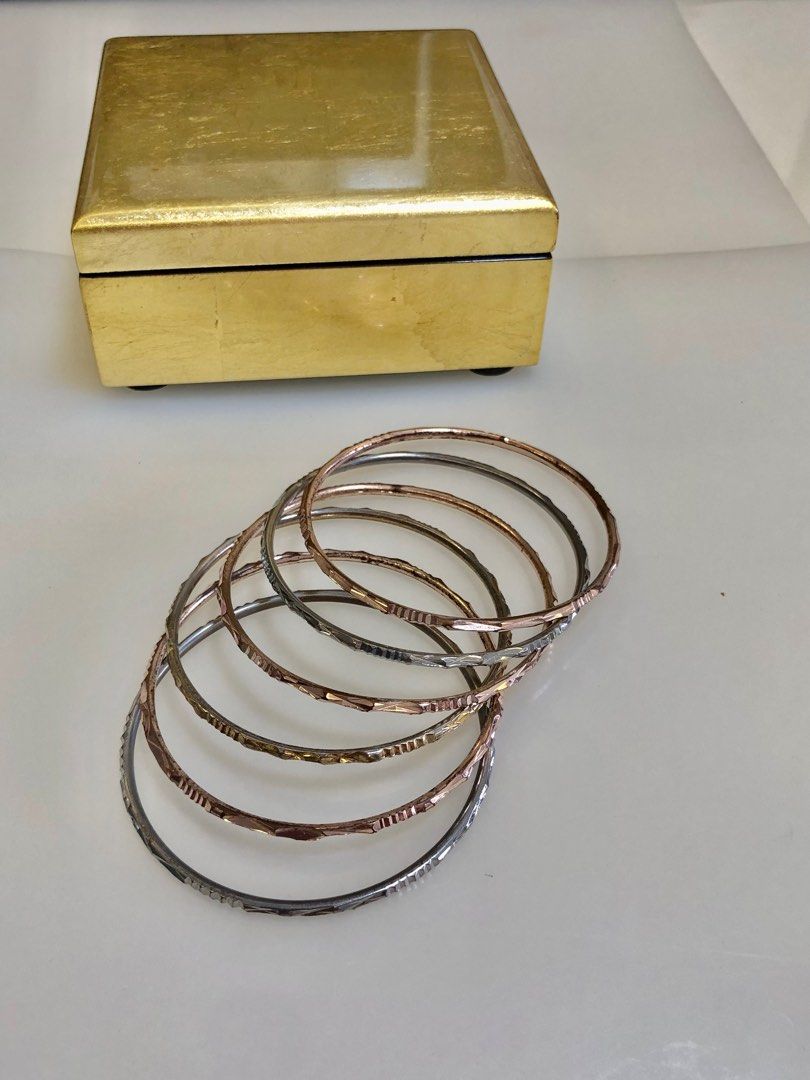 Gold over silver bracelets top