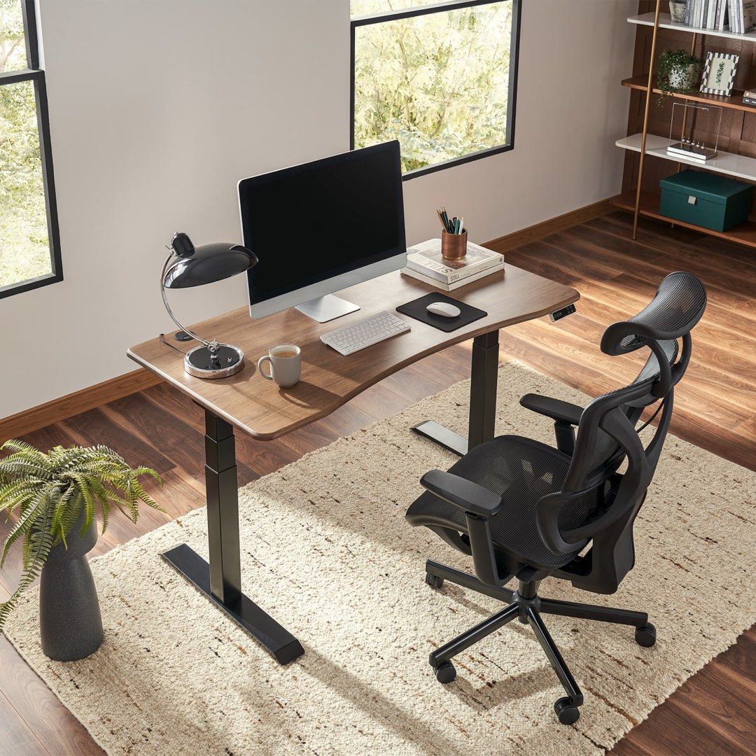 This ergonomic desk is heightadjustable, Furniture & Home Living