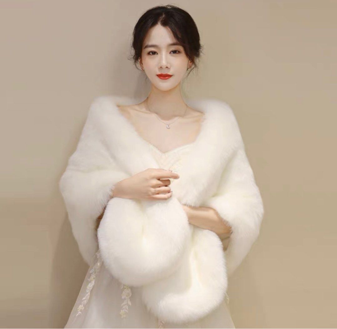White fluffy cape on sale