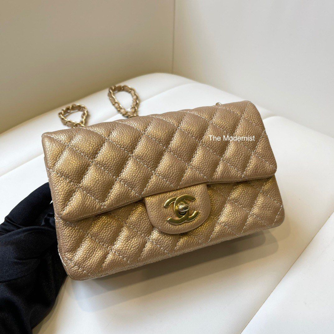 Authentic Chanel Antique Gold Caviar Leather Mini Flap Bag, Luxury, Bags &  Wallets on Carousell