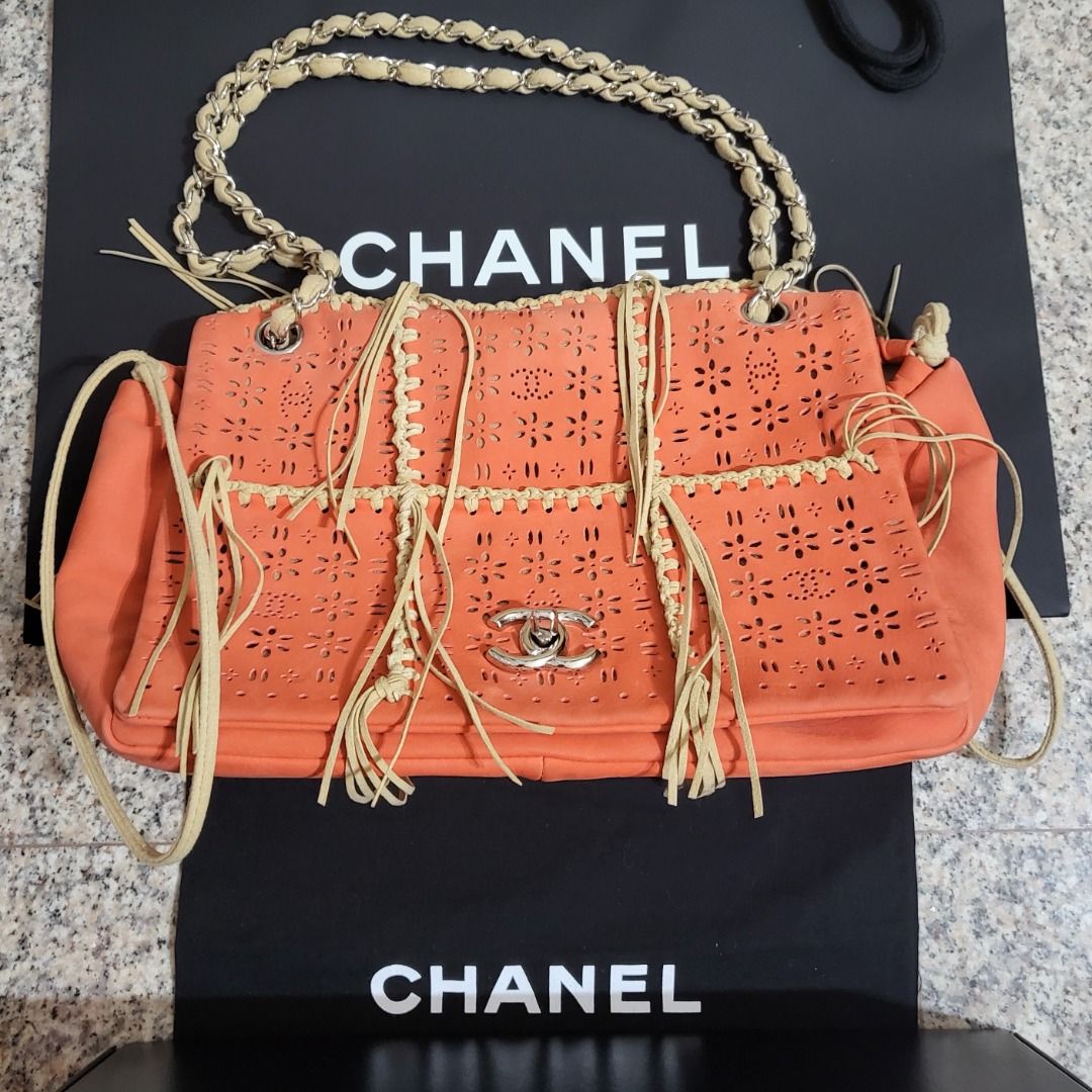 Authentic Chanel Laser Cut Fringe Calfskin Suede Drawstring Medium Flap Bag,  Luxury, Accessories on Carousell