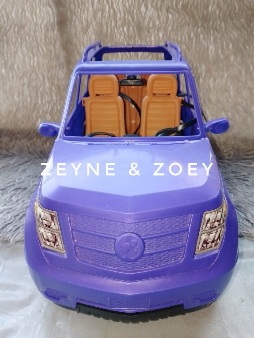 4 seater hotsell barbie doll car