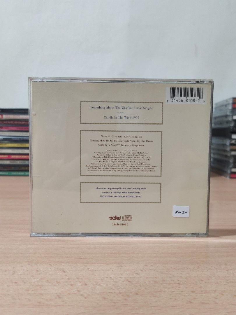  cd elton john something about the way you look tonight candle in the