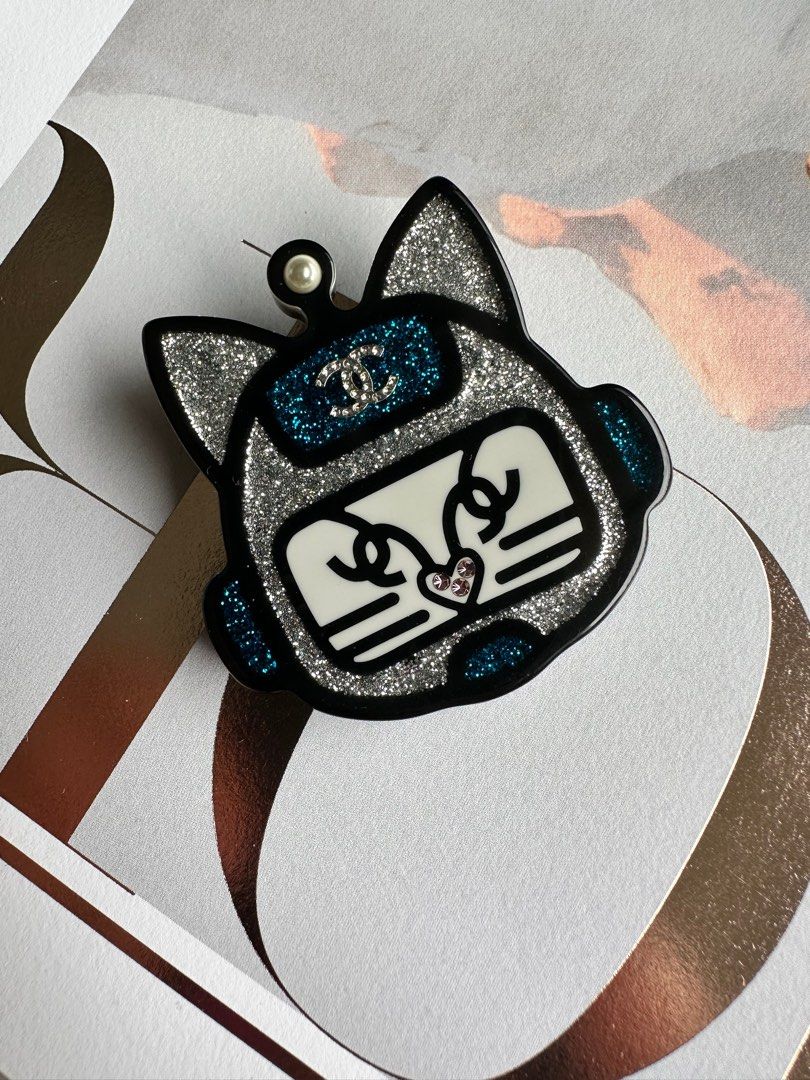 Chanel cat brooch deals