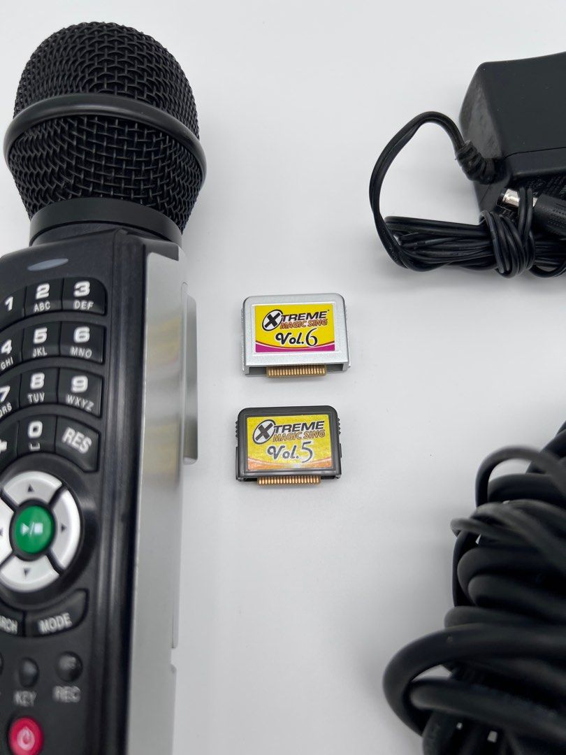 Extreme Magic Sing ET25K + 2 song chips (Category: Microphones) located in Quezon City. Submitted by greenthriftshopph (Listing ID 1161391539, Image 2). Description: 2 song chips Song Book Leather case RCA Complete accessories.