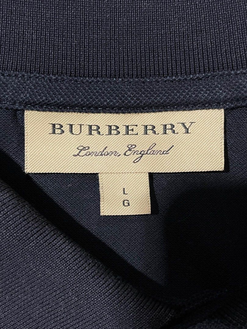 Genuine Burberry new logo Black Poloshirt, Men's Fashion, Tops & Sets,  Tshirts & Polo Shirts on Carousell