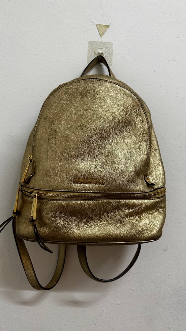 Michael kors gold backpack best sale