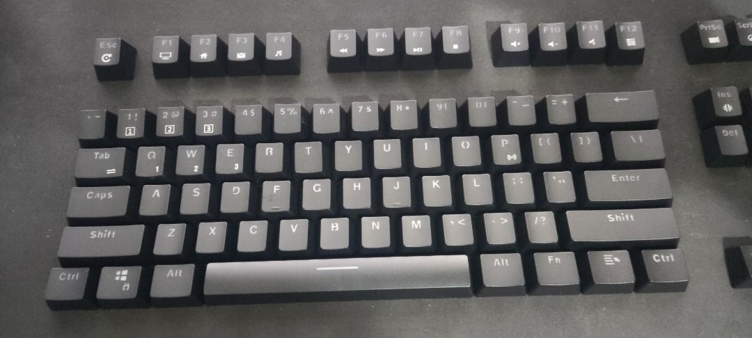 87 Keys Keycaps for Mechanical Keyboard ABS Two Color Backlit Keycap (pulled from RK87) (Category: Computer Keyboard) located in Taytay. Submitted by skywinter14 (Listing ID 1226319828, Image 2). Description: Color: Matte Black Shipping thru LBC/Lalamove/Toktok/Shopee Checkout. SF shouldered by buyer..
