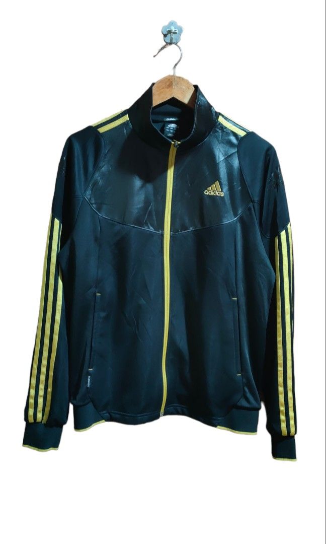 Adidas track jacket black leather with gold lining (Category: Coats, Jackets and Outerwear) located in Baler. Submitted by zaynyuan (Listing ID 1226325648, Image 2). Description: adidas track jacket (black leather with gold lining) Large on tag 27 length 21.5 width good as new.