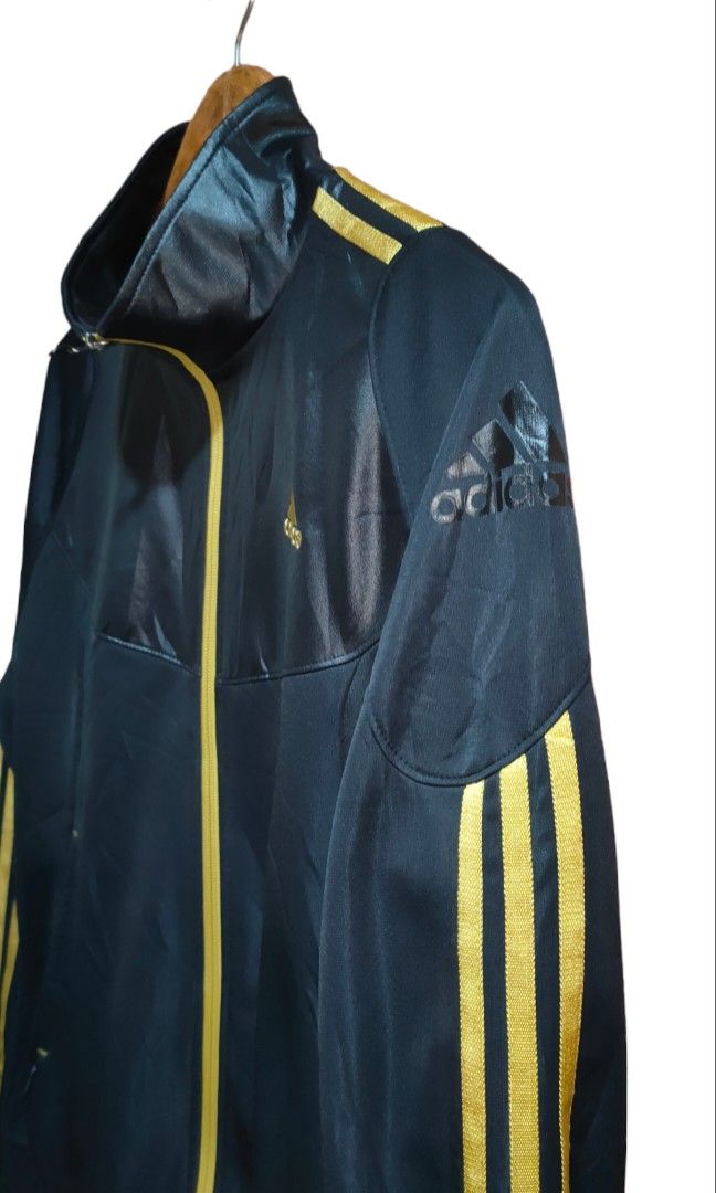 Adidas track jacket black leather with gold lining (Category: Coats, Jackets and Outerwear) located in Baler. Submitted by zaynyuan (Listing ID 1226325648, Image 3). Description: adidas track jacket (black leather with gold lining) Large on tag 27 length 21.5 width good as new.