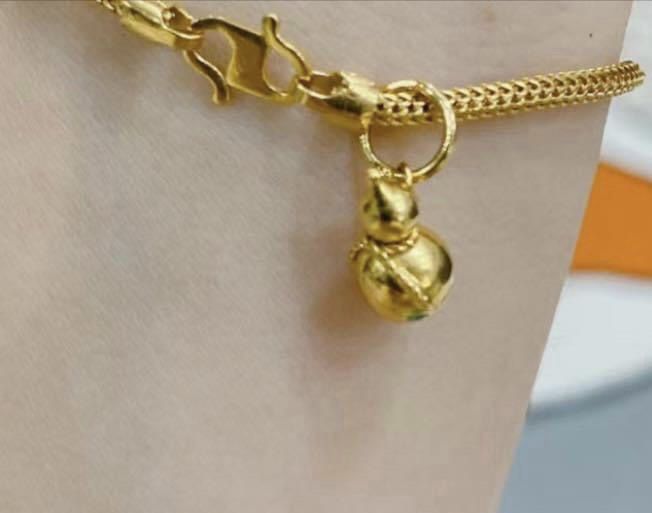 Gold money bag charm cheap