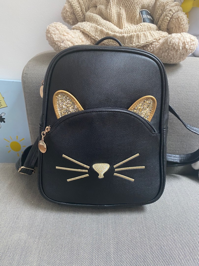 Black and gold cat backpack Women s Fashion Bags Wallets
