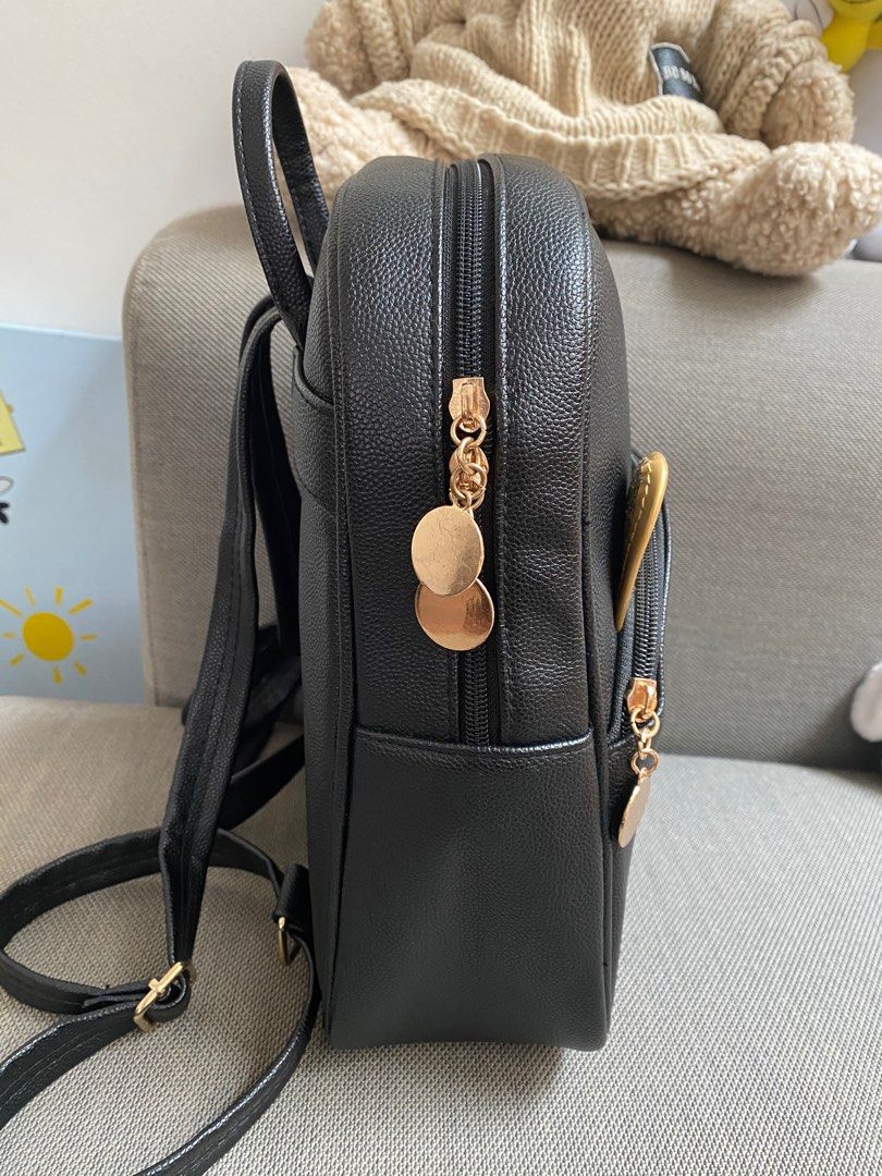 Gold shop cat backpack