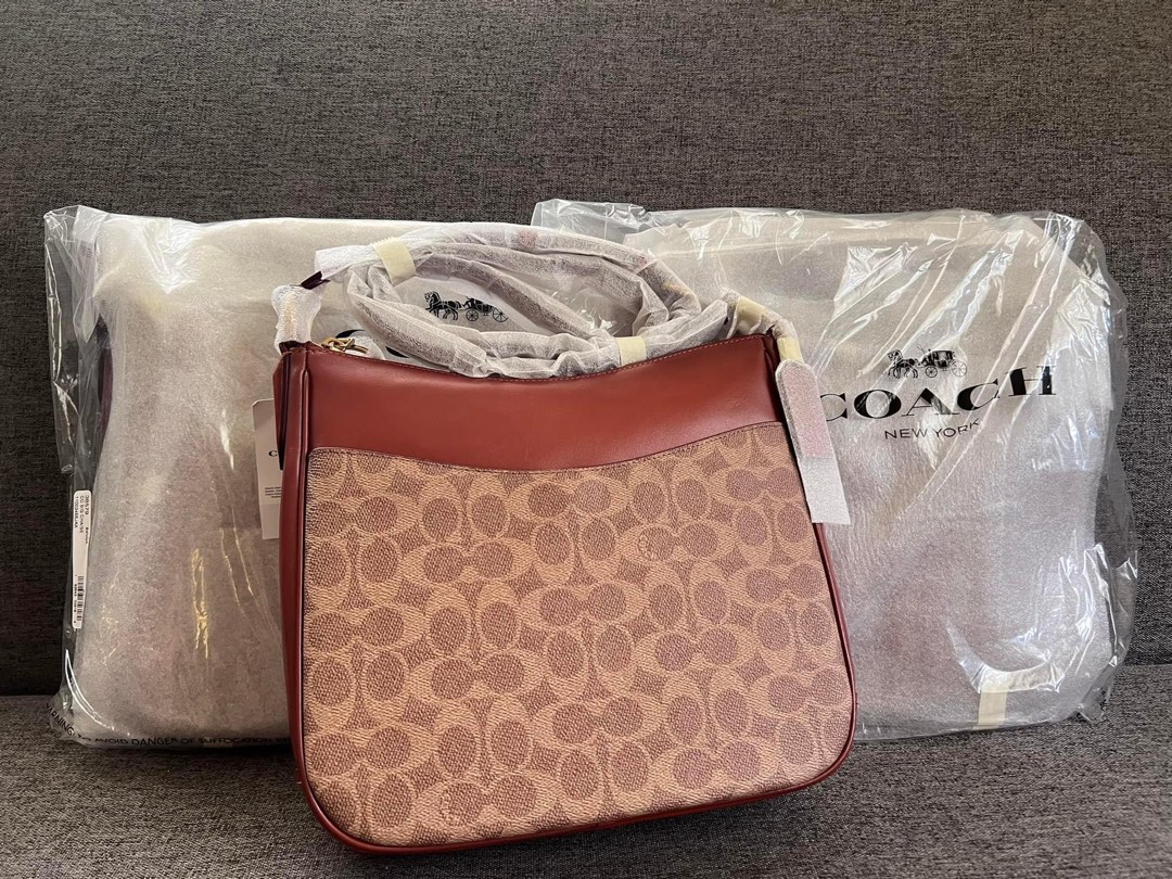 Coach Chaise Crossbody in Signature Coated Canvas In Tan/Rust on Carousell