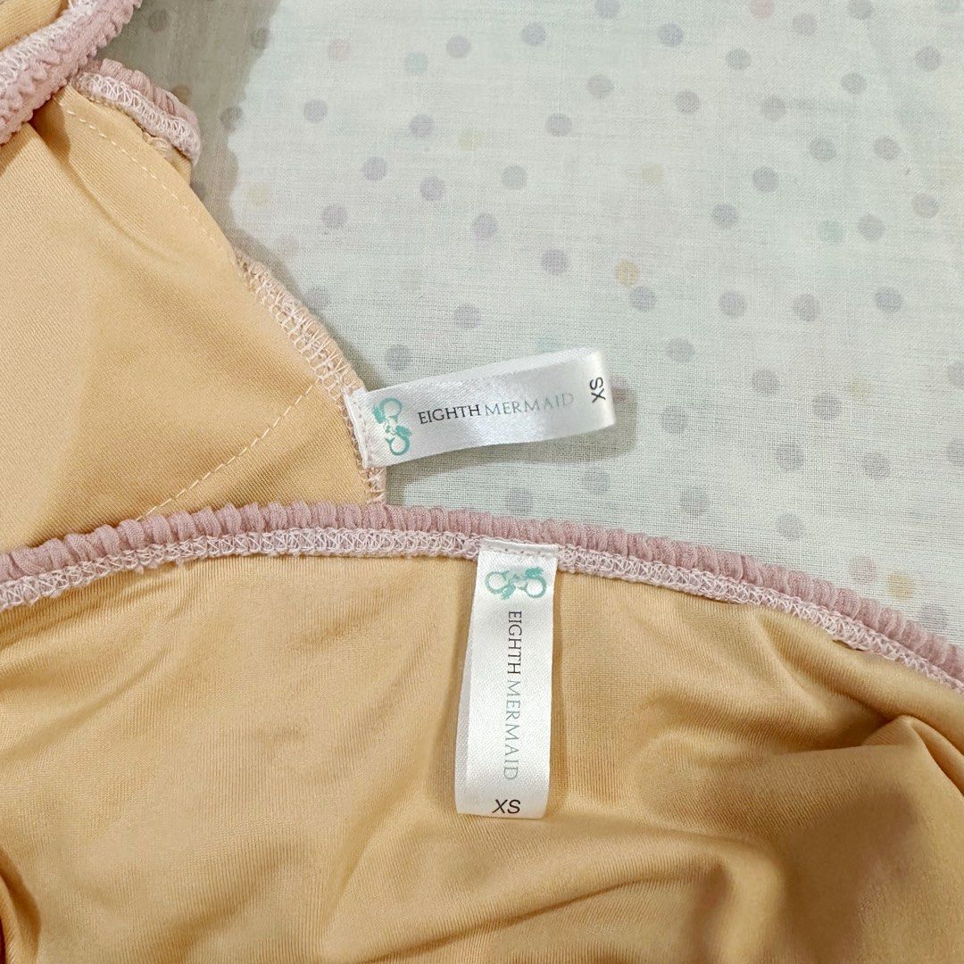 Eighth Mermaid Set (Category: Bikinis & Swimsuits) located in Santa Rita. Submitted by teydeclutters (Listing ID 1226334742, Image 3). Description: Eighth Mermaid Set -Frida top -Kimmi bottom -pink cameo fabric -with removable pads -only used once -not selling individually -comes with Eighth Mermaid pouch RFS - decluterring.