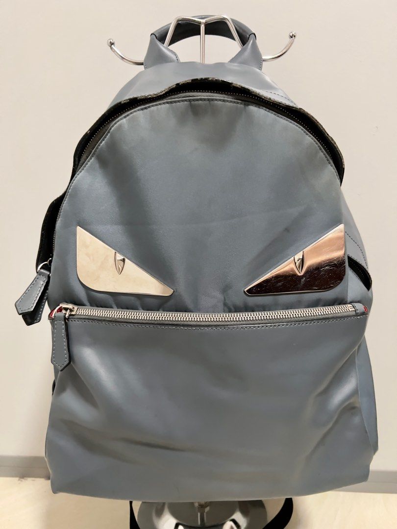 FENDI LEATHER BACKPACK (Category: Luxury Bags & Wallets) located in Calamba. Submitted by jjaluxe (Listing ID 1226438745, Image 1). Description: Pre-owned FENDI LEATHER BACKPACK In excellent condition with minimal signs of usage Rounded nylon backpack detailed with big leather Bag Bugs eyes, one front zipped leather pocket, zip-around closure, a top handle and adjustable shoulder straps. Cotton lining and padded rear panel..