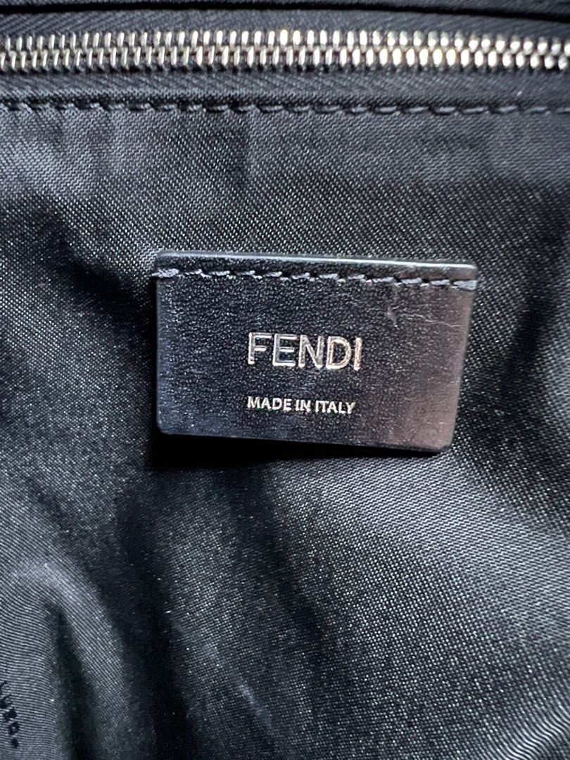 FENDI LEATHER BACKPACK (Category: Luxury Bags & Wallets) located in Calamba. Submitted by jjaluxe (Listing ID 1226438745, Image 3). Description: Pre-owned FENDI LEATHER BACKPACK In excellent condition with minimal signs of usage Rounded nylon backpack detailed with big leather Bag Bugs eyes, one front zipped leather pocket, zip-around closure, a top handle and adjustable shoulder straps. Cotton lining and padded rear panel..