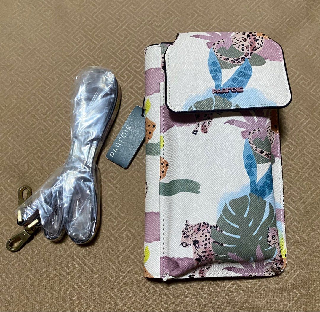 Parfois mobile phone case bag with wallet (Category: Cross-body Bags) located in Manila. Submitted by cinnamon5 (Listing ID 1226408864, Image 1). Description: Description * Brand new with tag and box * Parfois has some pretty phone holders, which you can sling on for easy access or use for extra protection while inside your bag. * These cases come in designs and sizes to fit most, if not all, phones, big or small. * No matter which one you get, i