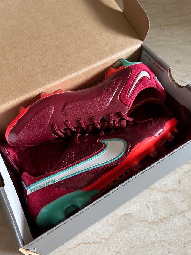 red and blue nike boots