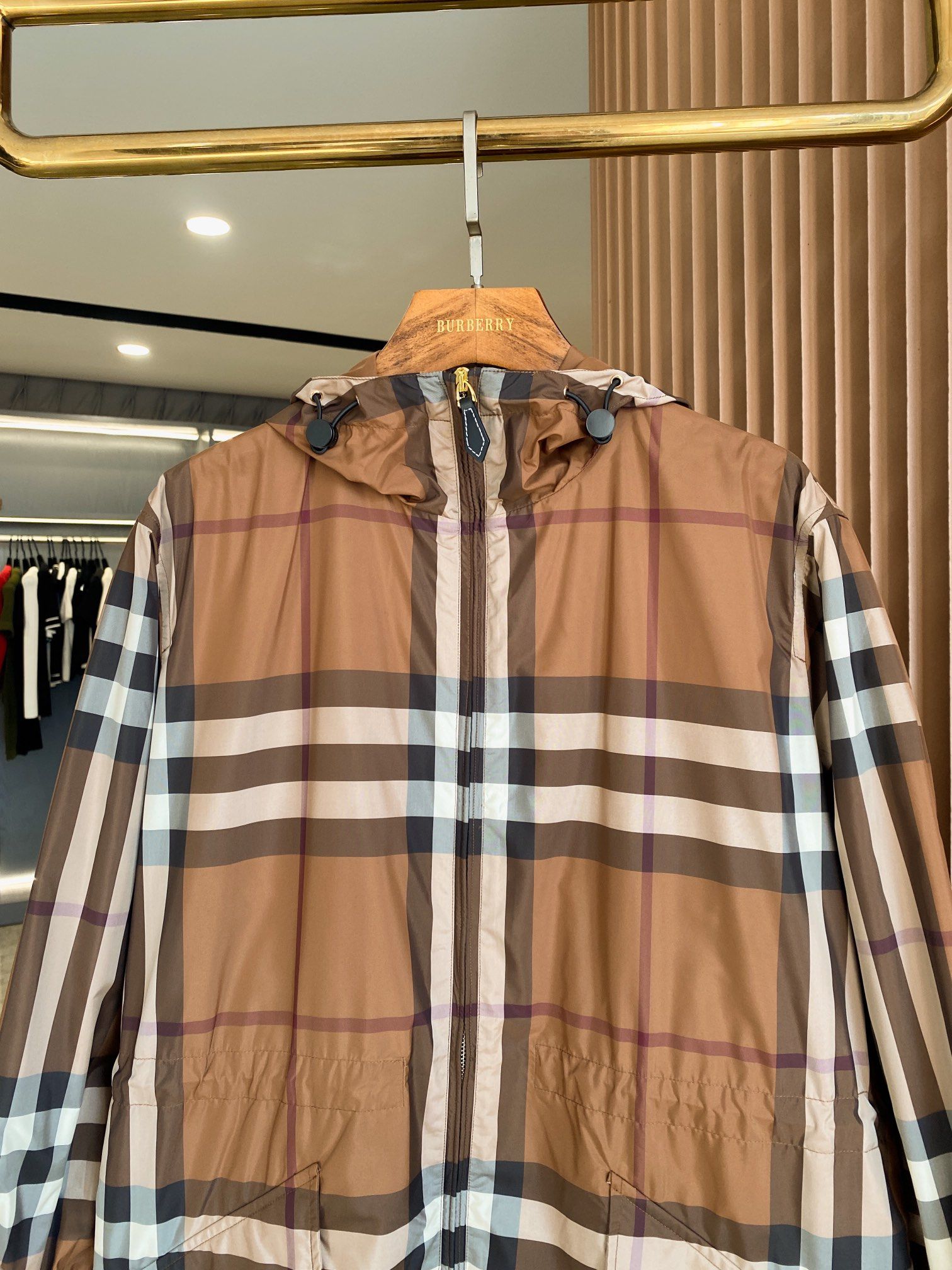 Authentic Burberry Lightweight short brown and wood colored large check snow jacket