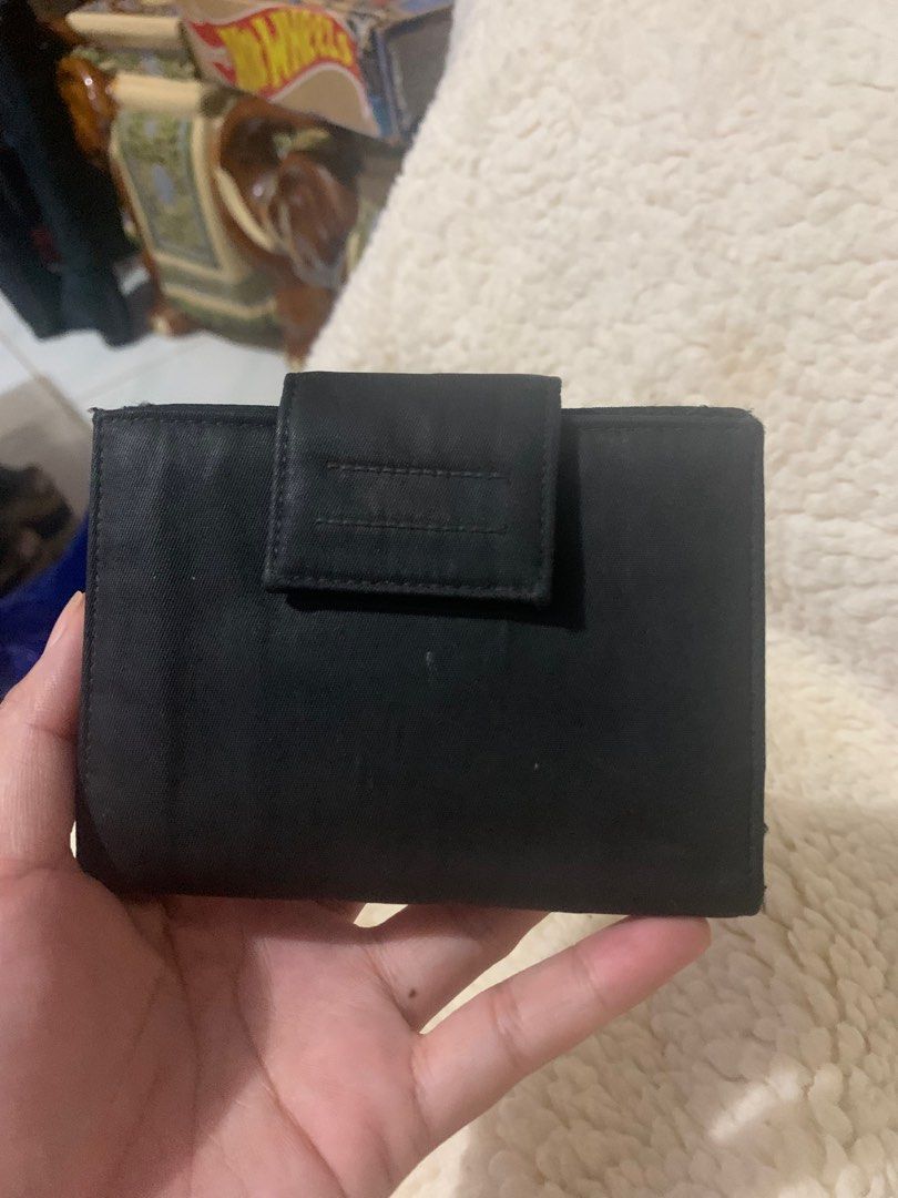 Authentic Prada wallet (Category: Luxury Bags & Wallets) located in Tacloban City. Submitted by classy_luxury (Listing ID 1226648354, Image 2). Description: Authentic Prada nylon wallet Preloved Guaranteed authentic Fade printed tag.