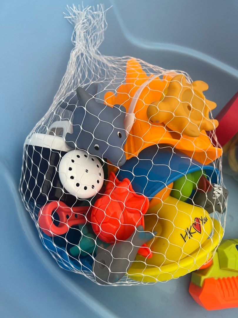 Bathtub with bath toys set (Category: Bathtub & Bath Accessories) located in Quezon City. Submitted by liz.ty (Listing ID 1226570682, Image 3). Description: Original plastic bathtub by Orocan. Very sturdy. -used for a year only Bath toys in net - brand new. (Rubber duck, Shovel, pail etc for beach also) Floating boat toy, used a few times only Water gun - wash but never been used Foam letters - well used but still in good condition. .