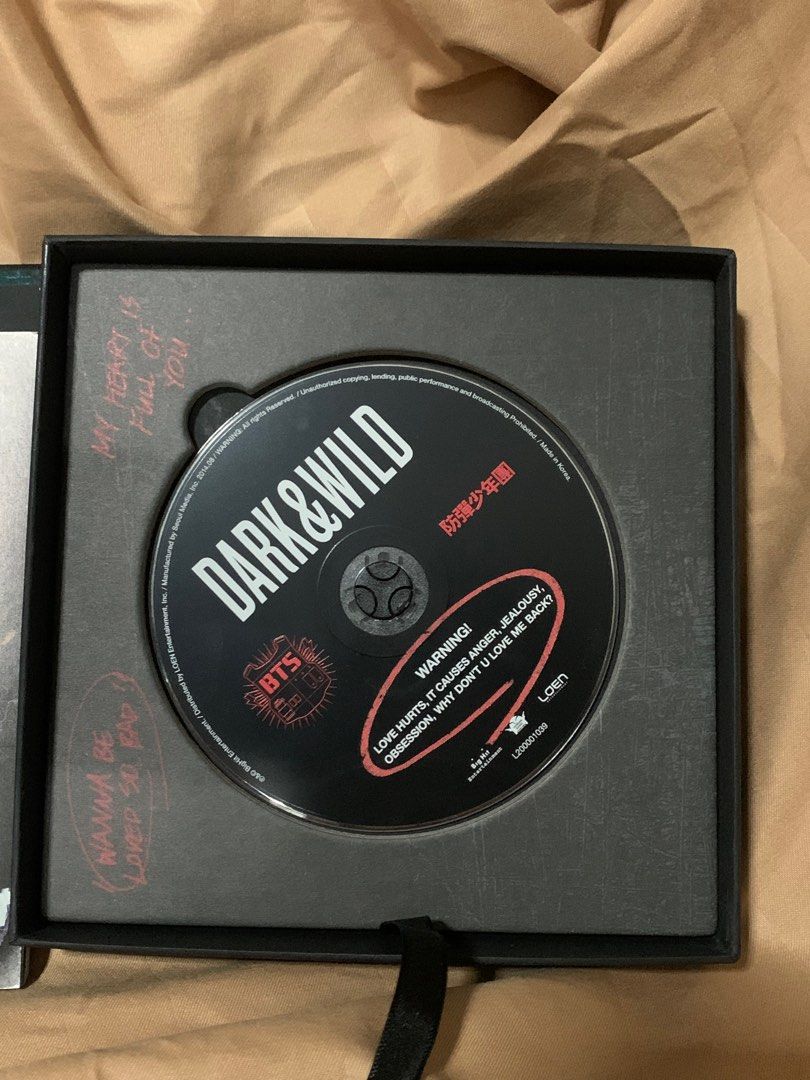 BTS Dark & Wild Album (unsealed) (Category: CDs & DVDs) located in Pasay City. Submitted by phenlene (Listing ID 1226653353, Image 3). Description: Dark & Wild - authentic! there is authentication sticker on back of album - includes: photobook, CD (heavily used) - open to price negotiation 👀.