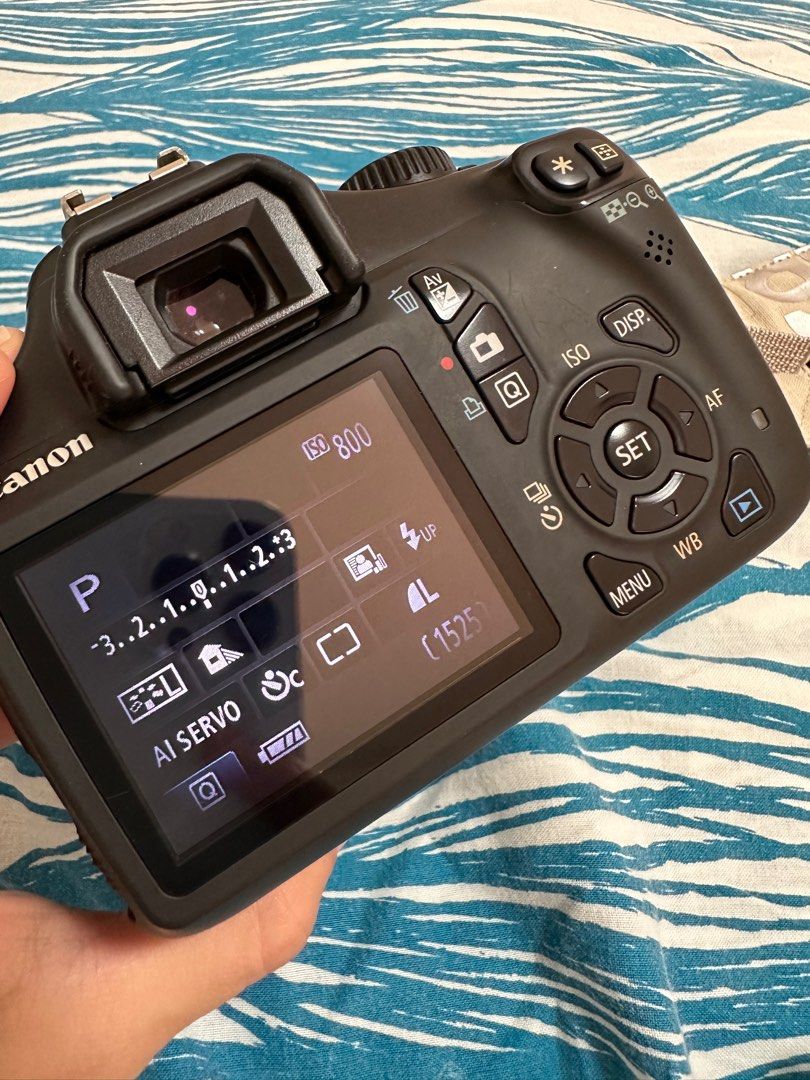 Canon 1100D (fixed price/pls see description) (Category: Cameras) located in Paranaque City. Submitted by hola.koala (Listing ID 1221591539, Image 3). Description: minor issues (please see photos) *lcd vignette *rubber to cover the port on the side was removed due to long storage Main Features Can record videos 12MP - APS-C CMOS Sensor ISO 100 - 6400 2.70” Fixed Type Screen Optical (pentamirror) viewfinder 3.0fps continuous shooting 495g. 130 x 1