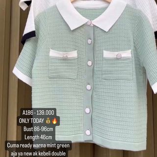 Knit double pocket button mint green top