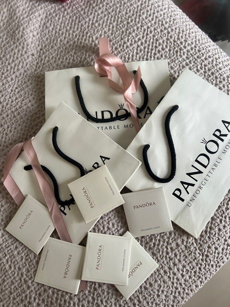 Pandora paper bag (Category: Luxury Bags & Wallets) located in Pasig City. Submitted by lai08. (Listing ID 1226584359, Image 1). Description: 3 paper bags with 6pcs polishing cloth .