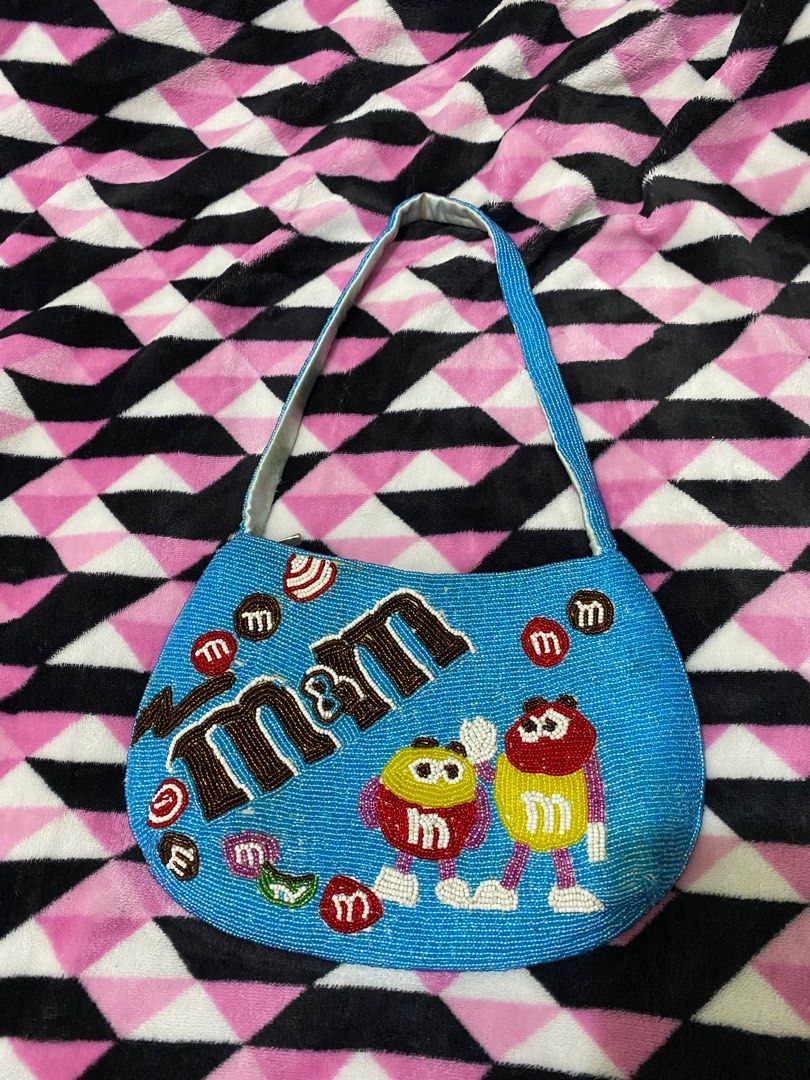 BEADED M&M bag (Category: Shoulder Bags) located in Baguio. Submitted by nicsguia (Listing ID 1226818062, Image 1). Description: Super cute, just the yellowish parts. The beads super fine 👌🏼.