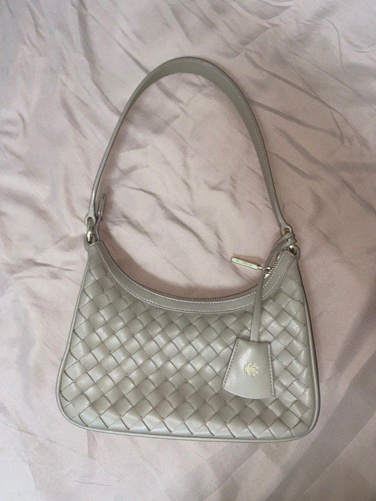 ChristyNg.com - The Silvia woven hobo bag is made from