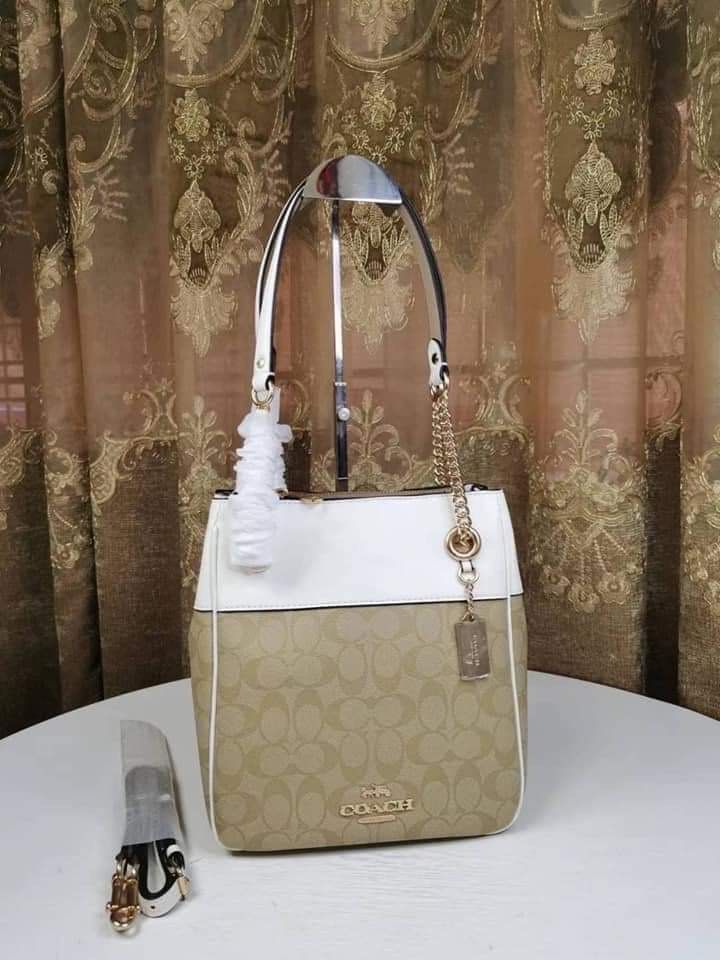 Coach Cammie Bucket Bag (Category: Luxury Bags & Wallets) located in Rizal. Submitted by LuxbyMarifrance (Listing ID 1226868671, Image 3). Description: 🏷️ 3,000 only + SF 🛍 C Cammie Chain Bucket Bag In Signature Canvas 📏 9 1/4” (L) x 10 1/4” (H) x 4 3/4” (W) 📌 with dust bag and paper bag ✨All trademarks, logos and brand names are reserved and property of the original brand owners. #coachph #authenticqualitybagsph #authenticqualitybags #lowest