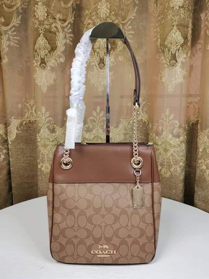 Coach Cammie Bucket Bag (Category: Luxury Bags & Wallets) located in Rizal. Submitted by LuxbyMarifrance (Listing ID 1226868671, Image 2). Description: 🏷️ 3,000 only + SF 🛍 C Cammie Chain Bucket Bag In Signature Canvas 📏 9 1/4” (L) x 10 1/4” (H) x 4 3/4” (W) 📌 with dust bag and paper bag ✨All trademarks, logos and brand names are reserved and property of the original brand owners. #coachph #authenticqualitybagsph #authenticqualitybags #lowest