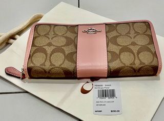 Coach Ladies Long wallet retailing at SGD425
