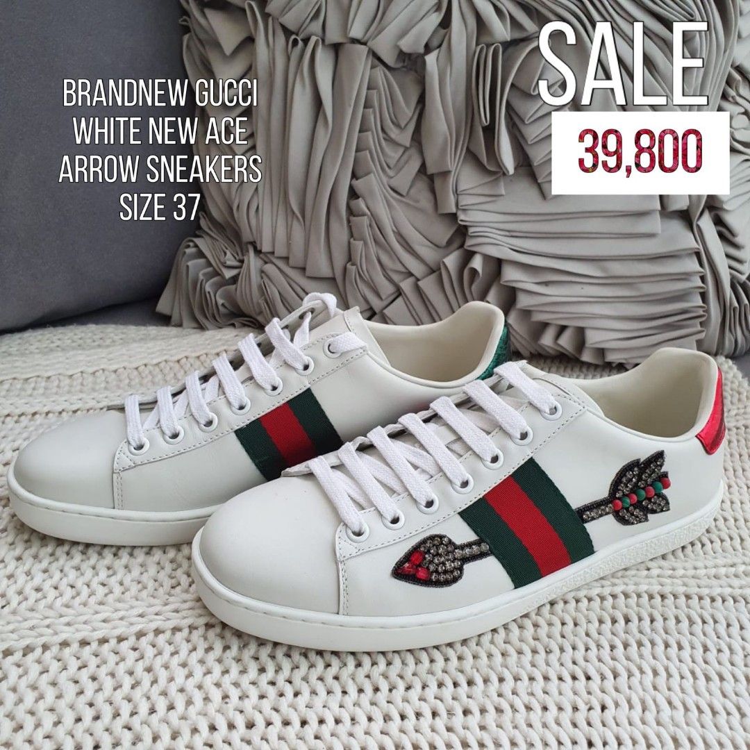 Gucci sneakers with arrow sales